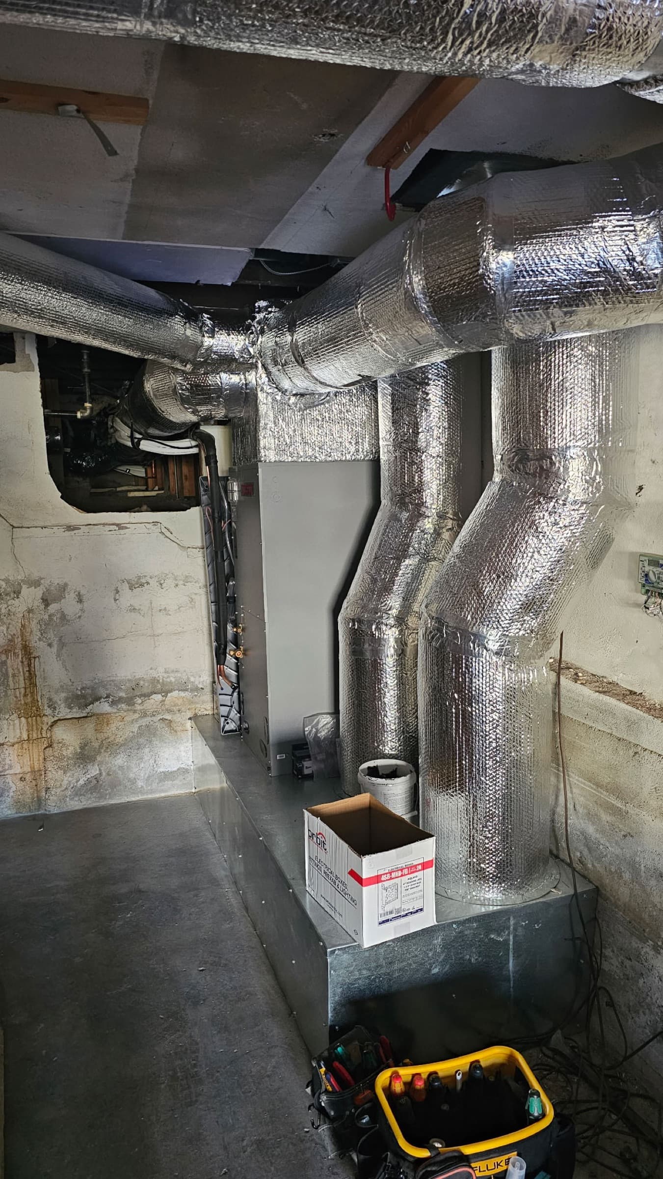 Air handler with new insulated ductwork installation