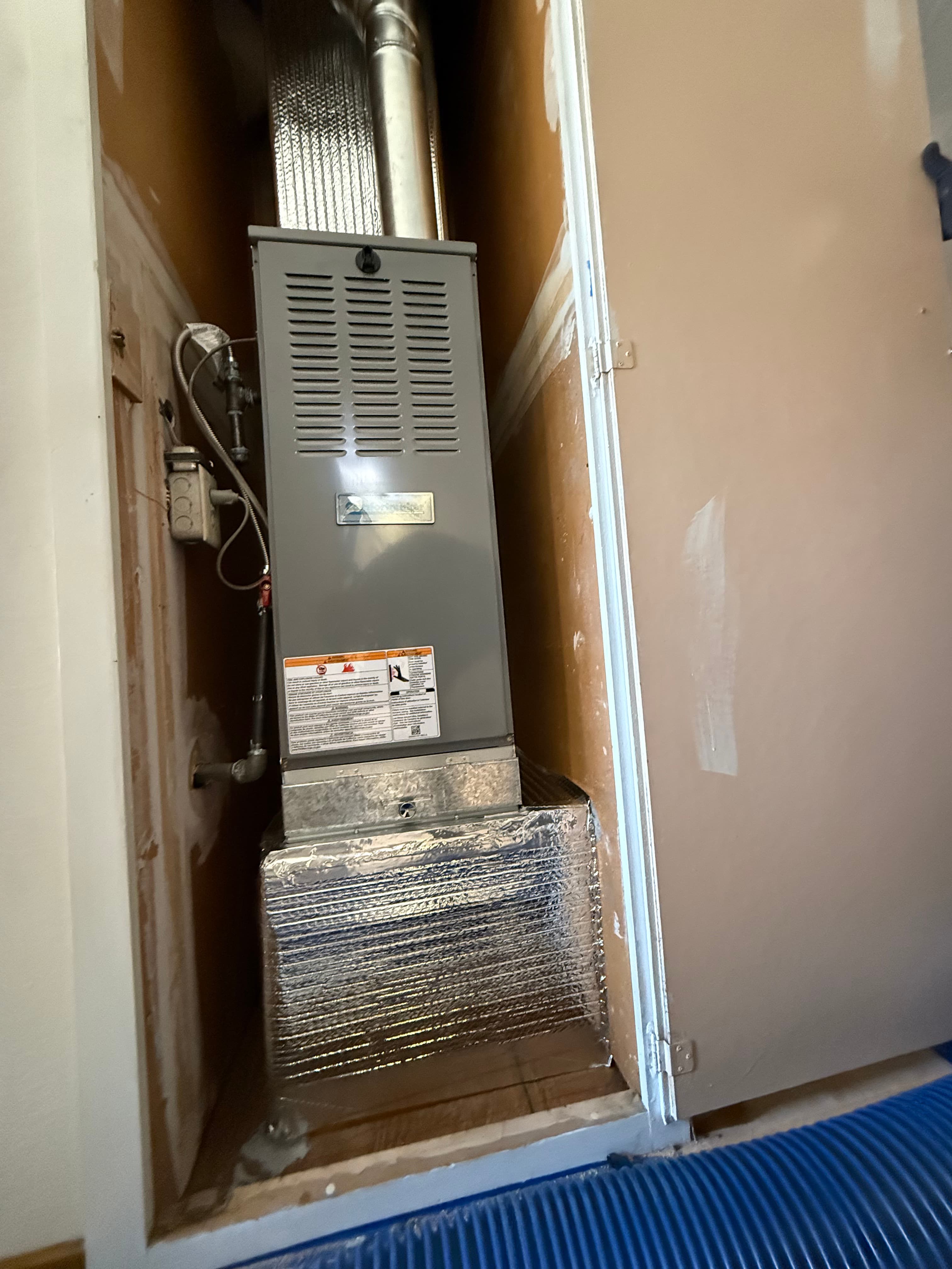 Gas furnace installed in closet alcove